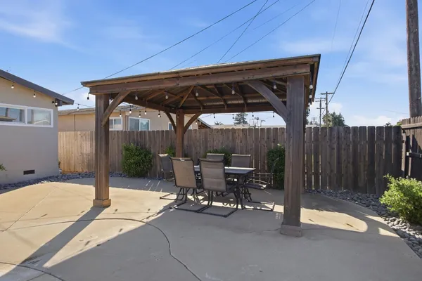 a view of a swimming pool with a patio