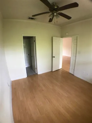 a kitchen with granite countertop a stove a sink and dishwasher