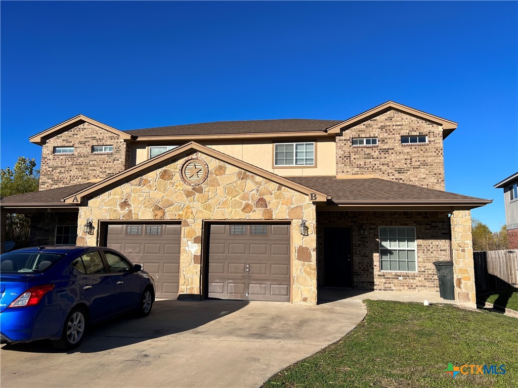 1105 Grace Point Drive Killeen, TX 76549 - Photo 2 of 25 a view of a car park in front of house