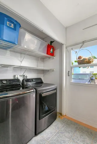a stove top oven sitting inside of a kitchen