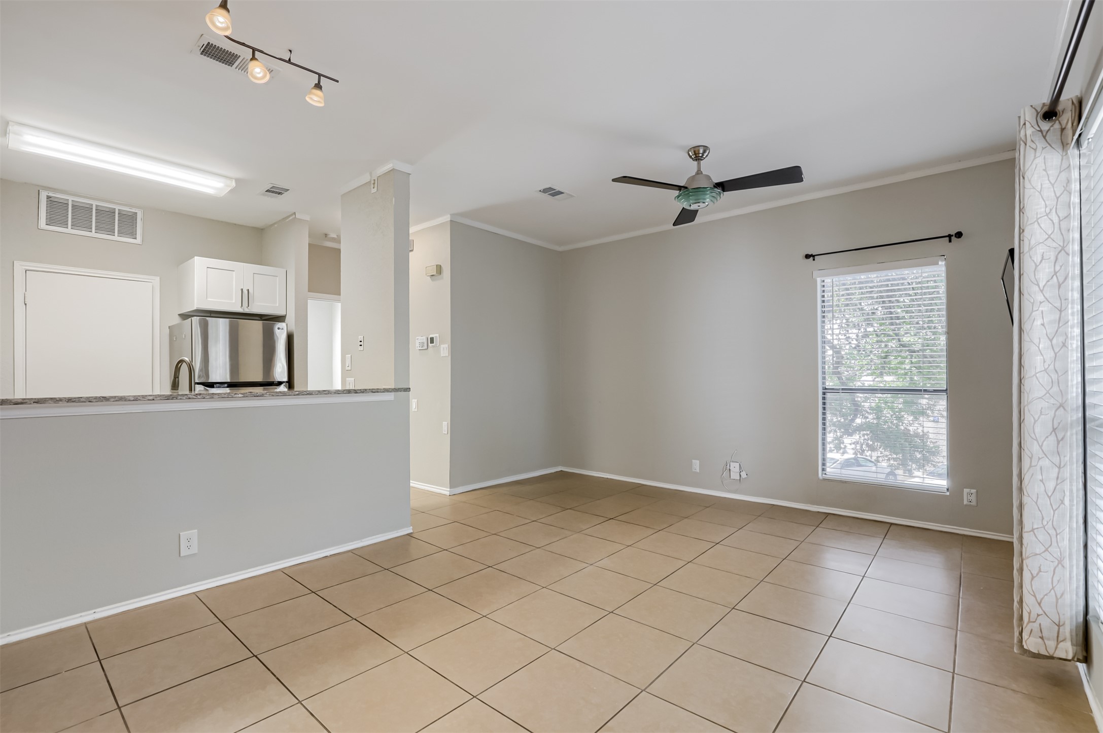 802 South 1st Street, Unit 206 Austin, TX 78704 - Photo 1 of 18 a view of an empty room with a window