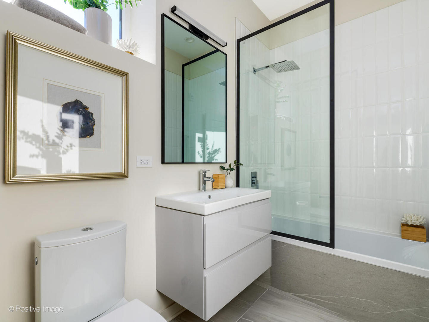 8308 West Center Avenue, Unit 303 River Grove, IL 60171 - Photo 17 of 24 a bathroom with a sink and a mirror