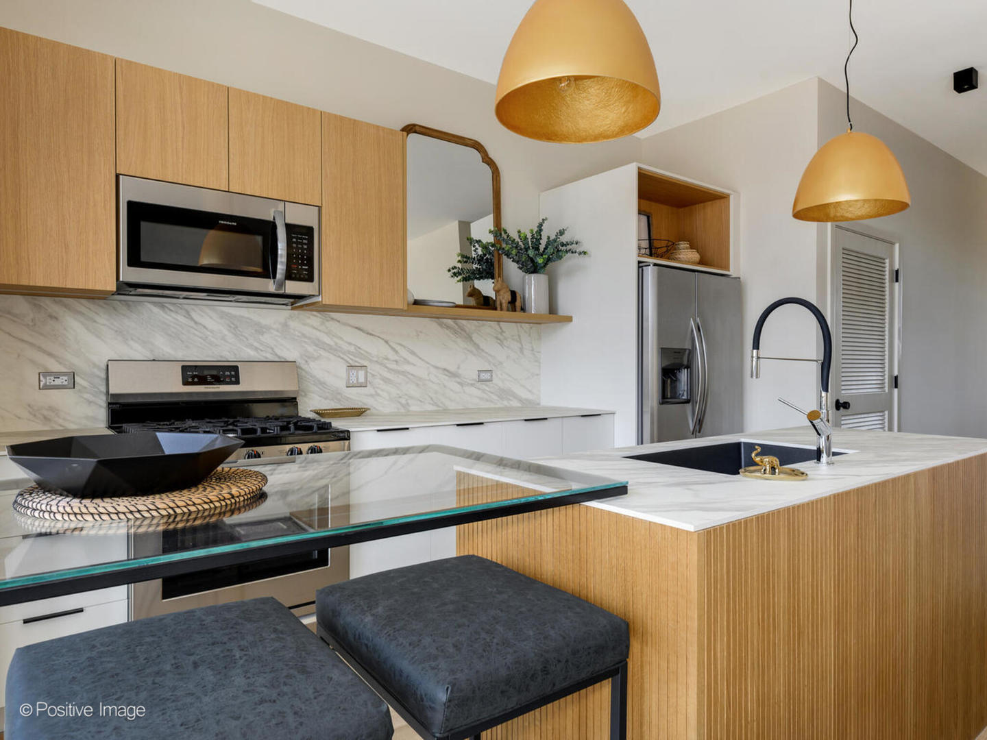 8308 West Center Avenue, Unit 303 River Grove, IL 60171 - Photo 6 of 24 a kitchen with a stove a sink and a microwave