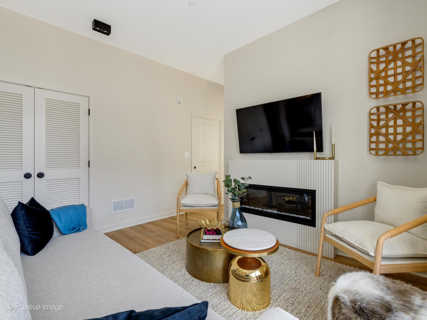 8308 West Center Avenue, Unit 303 River Grove, IL 60171 - Photo 10 of 24 a living room with furniture and a flat screen tv