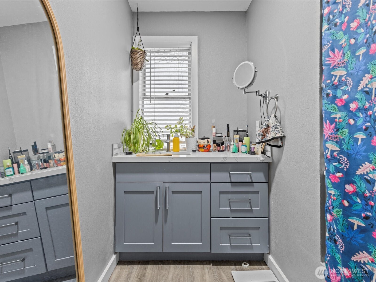 7138 47th Avenue Southwest Seattle, WA 98136 - Photo 14 of 20 a bathroom with a sink a vanity and a window