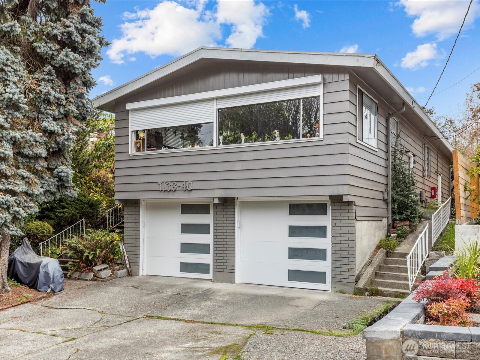 7138 47th Avenue Southwest Seattle, WA 98136 - Photo 18 of 20 a house view with a outdoor space