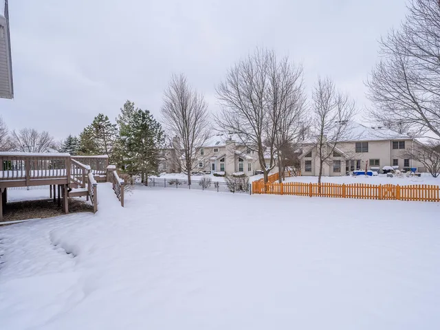 a view of outdoor space with swimming pool and sitting area