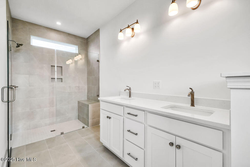 5209 Moonshell Loop Wilmington, NC 28412 - Photo 19 of 37 Primary Bathroom with Dual Vanity and Zero Entry, fully tiled shower