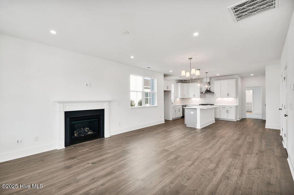 5209 Moonshell Loop Wilmington, NC 28412 - Photo 8 of 37 Living Room with natural gas fireplace.