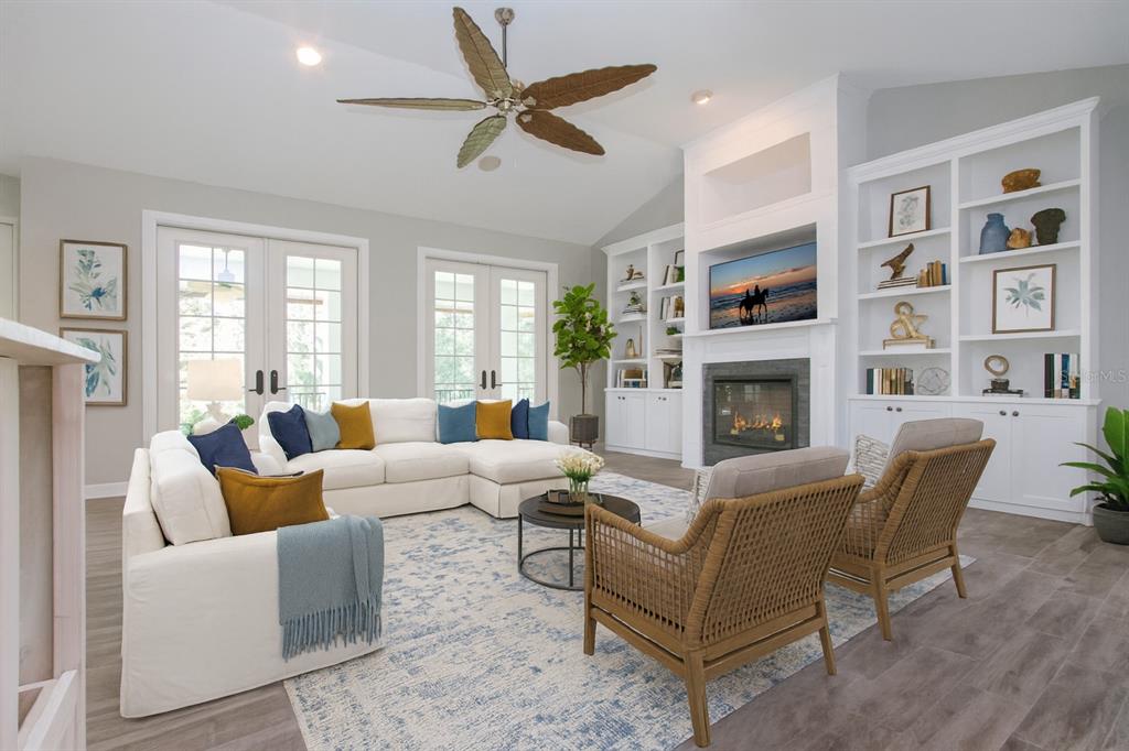 1422 Lightfoot Road Wimauma, FL 33598 - Photo 20 of 98 a living room with furniture fireplace and a window