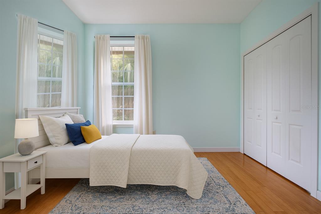 1422 Lightfoot Road Wimauma, FL 33598 - Photo 42 of 98 a bedroom with a bed and window