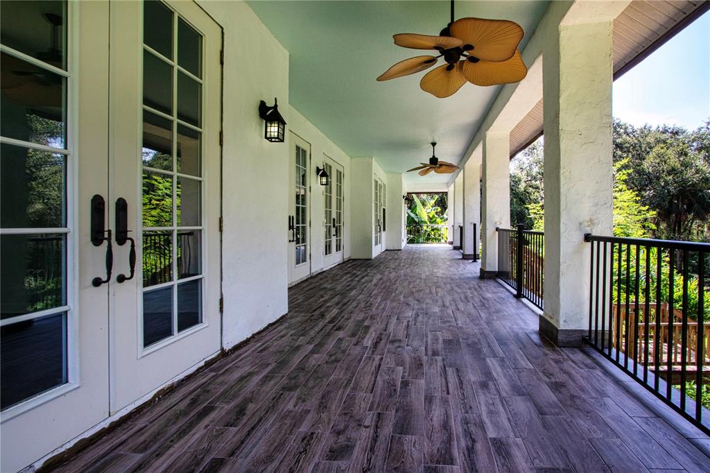 1422 Lightfoot Road Wimauma, FL 33598 - Photo 53 of 98 a view of a house with wooden floor