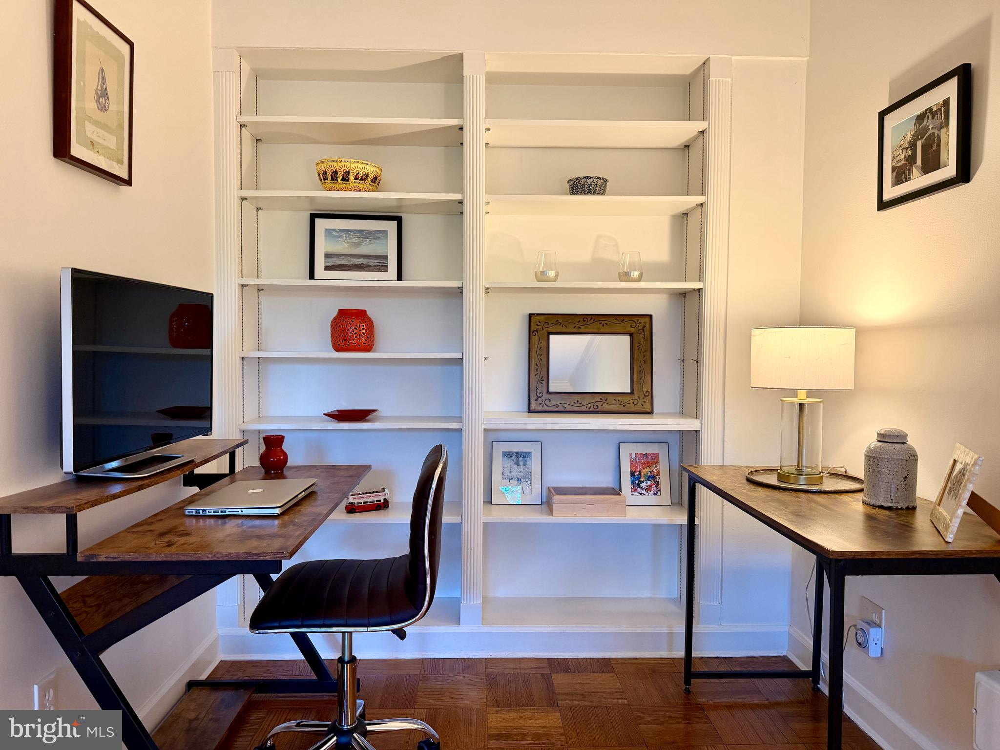 2500 Q Street Northwest, Unit 307 Washington, DC 20007 - Photo 4 of 17 a view of a workspace with furniture