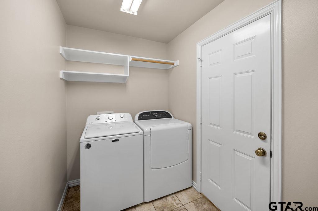 863 County Road 2950 Alba, TX 75410 - Photo 20 of 33 a utility room with dryer and washer