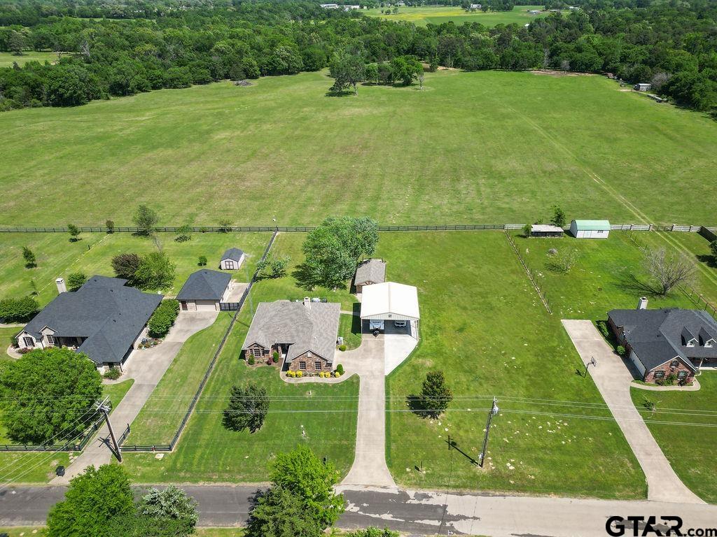 863 County Road 2950 Alba, TX 75410 - Photo 29 of 33 an aerial view of a house with a yard