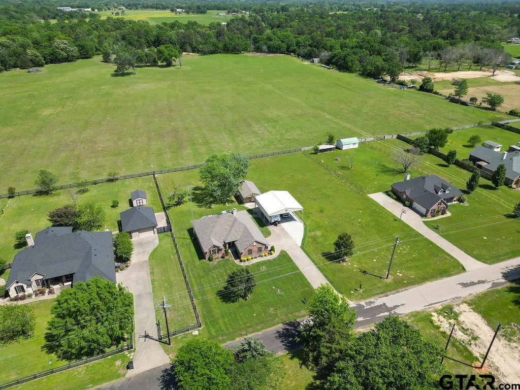 863 County Road 2950 Alba, TX 75410 - Photo 30 of 33 an aerial view of a houses with outdoor space and a lake view