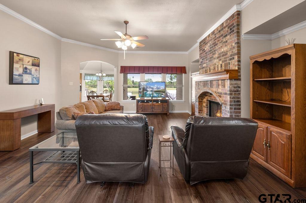 863 County Road 2950 Alba, TX 75410 - Photo 6 of 33 a living room with furniture and a fireplace
