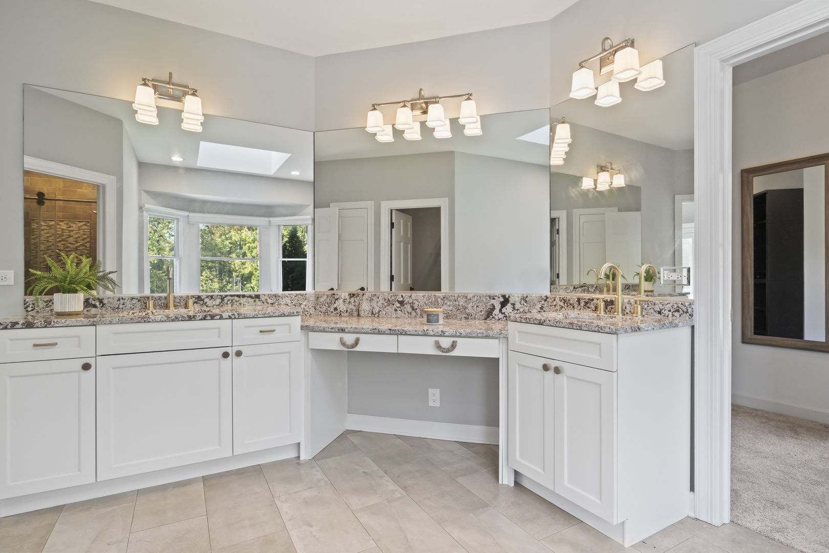 36W669 Crane Road St. Charles, IL 60174 - Photo 26 of 62 a bathroom with a sink vanity and a mirror