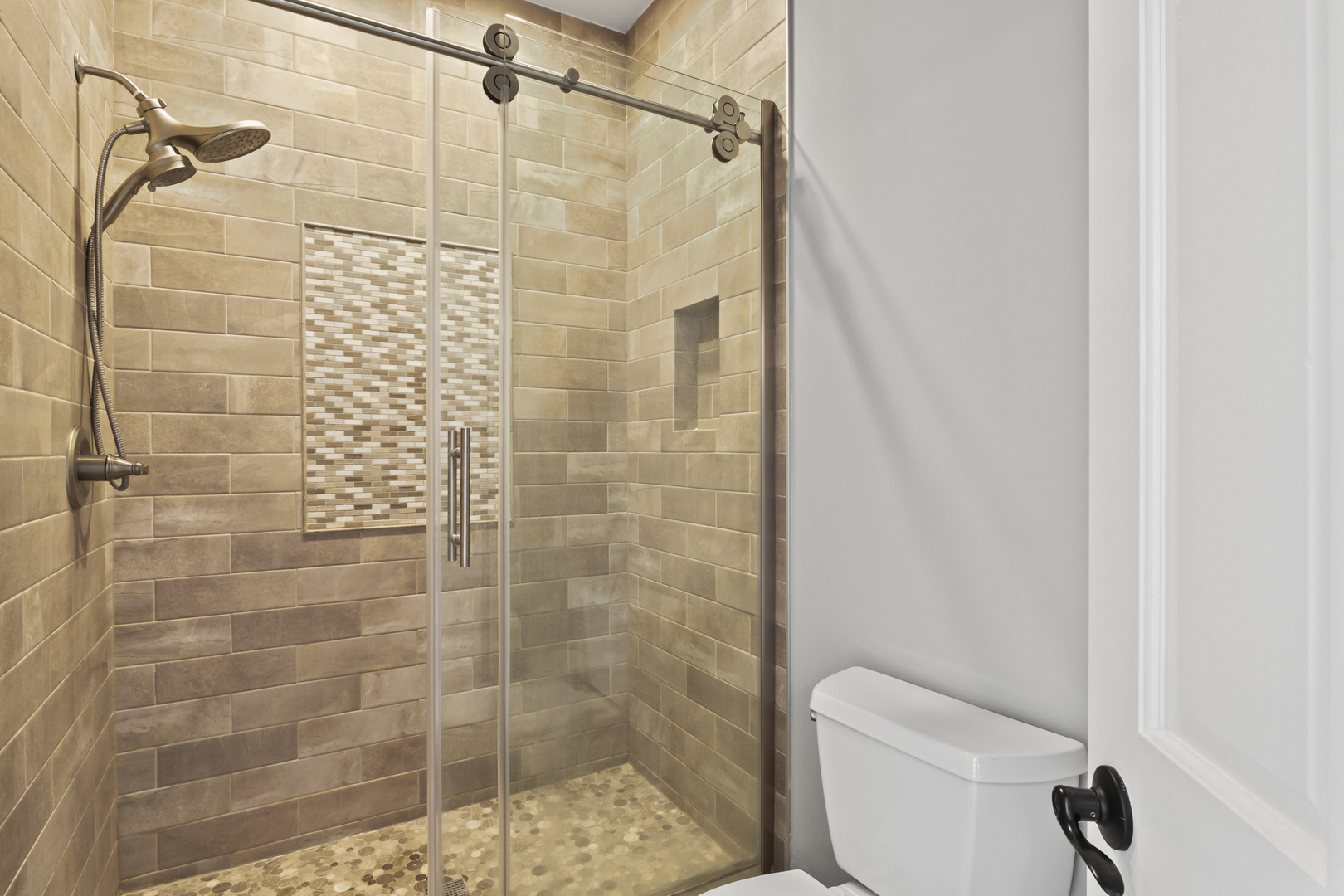 36W669 Crane Road St. Charles, IL 60174 - Photo 27 of 62 a bathroom with a shower and toilet