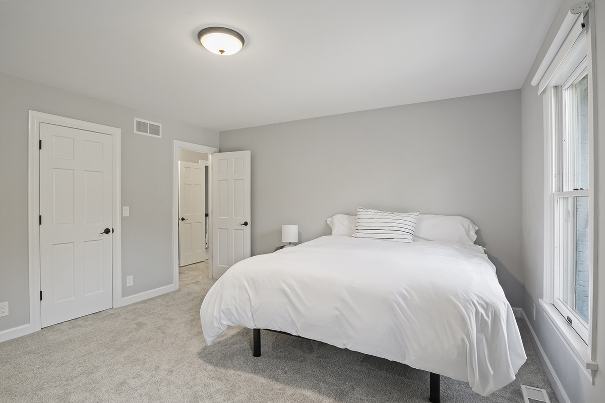 36W669 Crane Road St. Charles, IL 60174 - Photo 32 of 62 a bedroom with a bed and a window