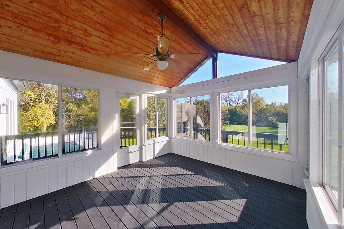 36W669 Crane Road St. Charles, IL 60174 - Photo 50 of 62 a view of an empty room with wooden floor and a window