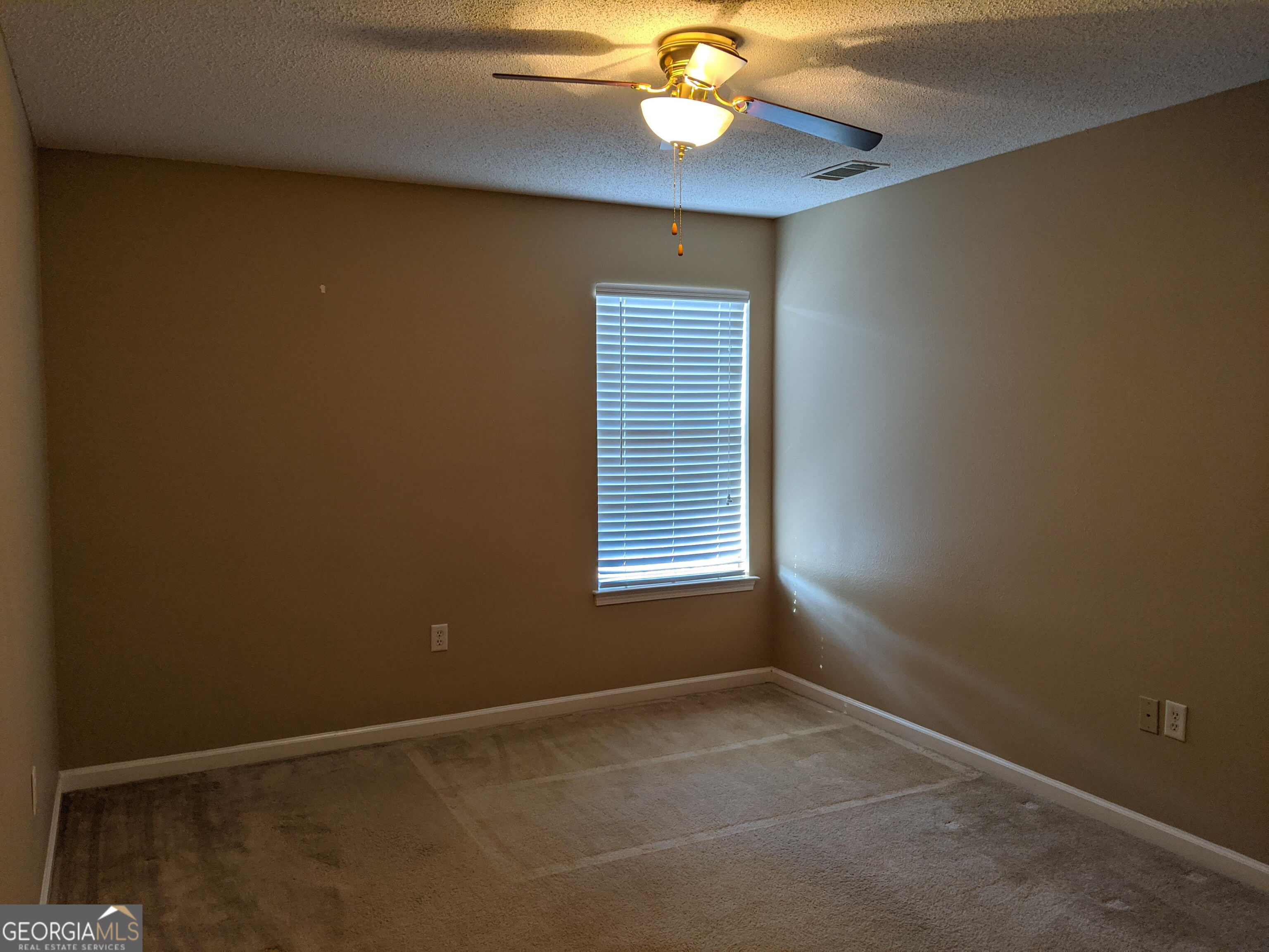 1014 Towne Park Drive East Rincon, GA 31326 - Photo 11 of 21 a view of an empty room with a window