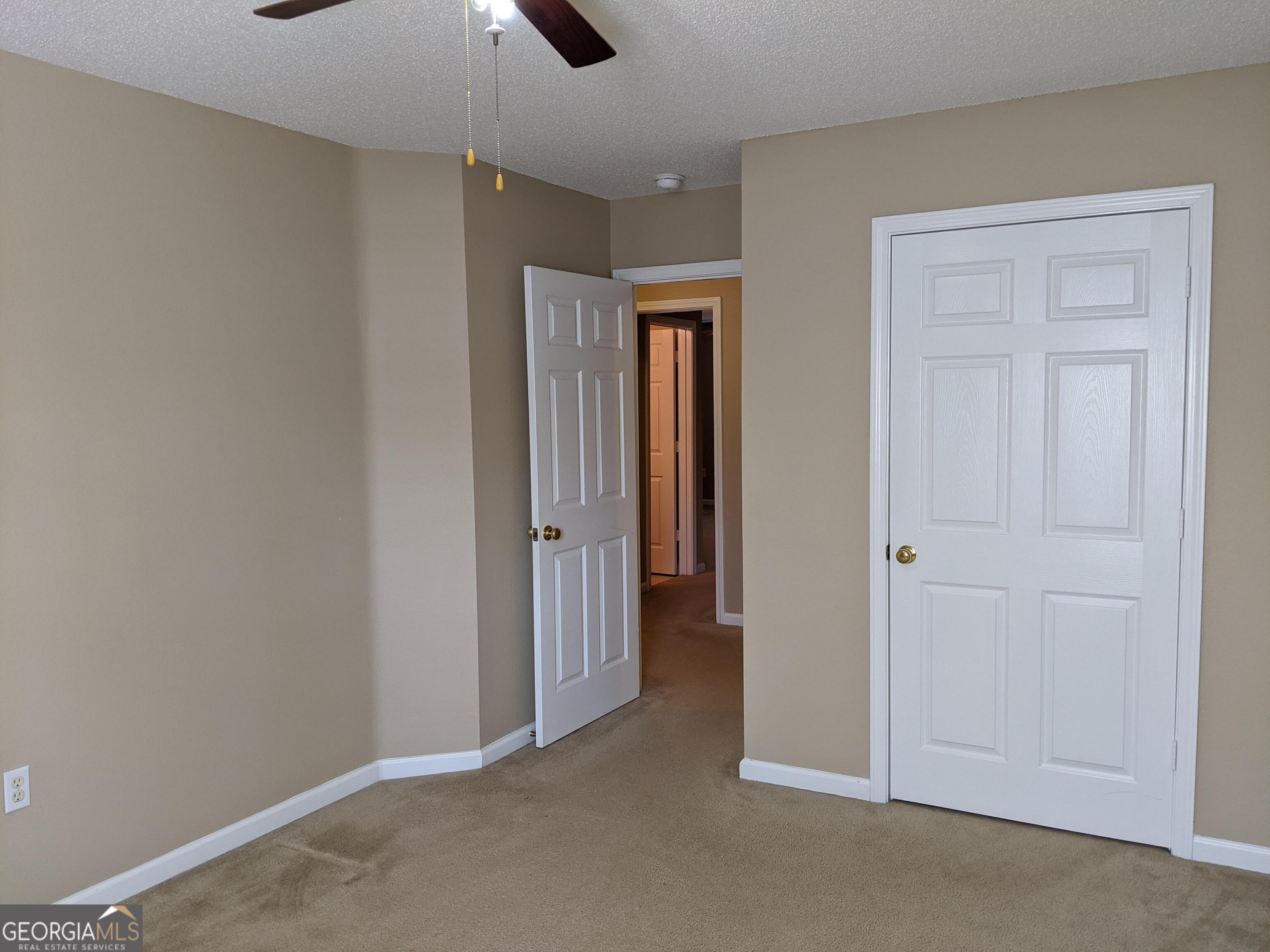 1014 Towne Park Drive East Rincon, GA 31326 - Photo 12 of 21 a view of an empty room and chandelier fan