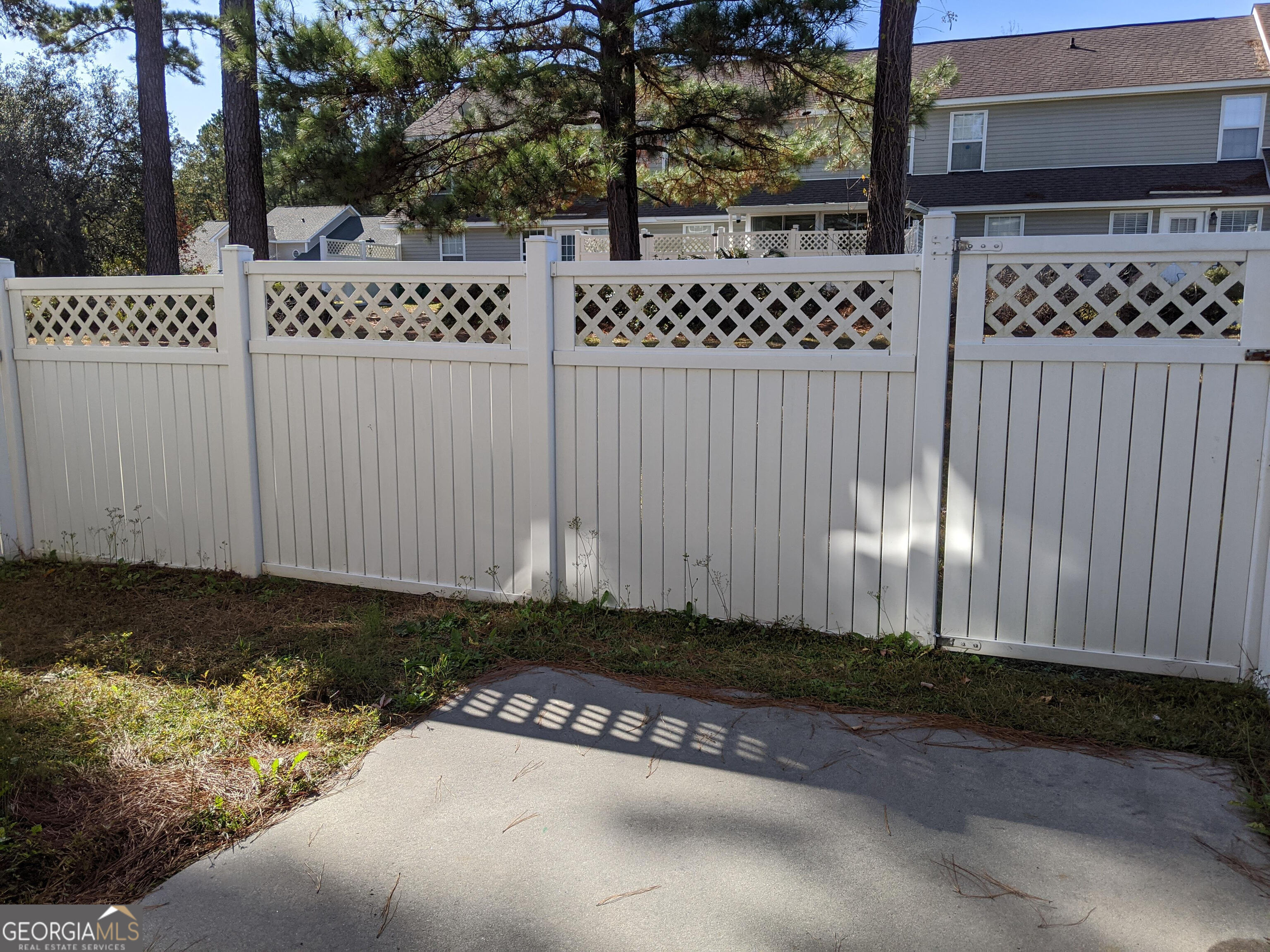 1014 Towne Park Drive East Rincon, GA 31326 - Photo 13 of 21 a view of a wooden fence