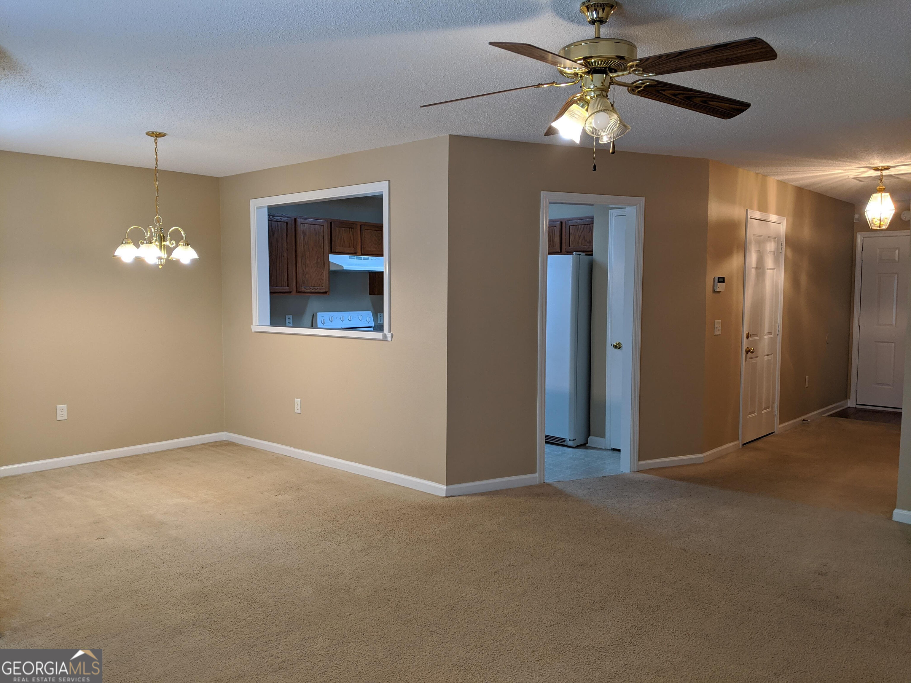 1014 Towne Park Drive East Rincon, GA 31326 - Photo 2 of 21 a view of an empty room with a fan