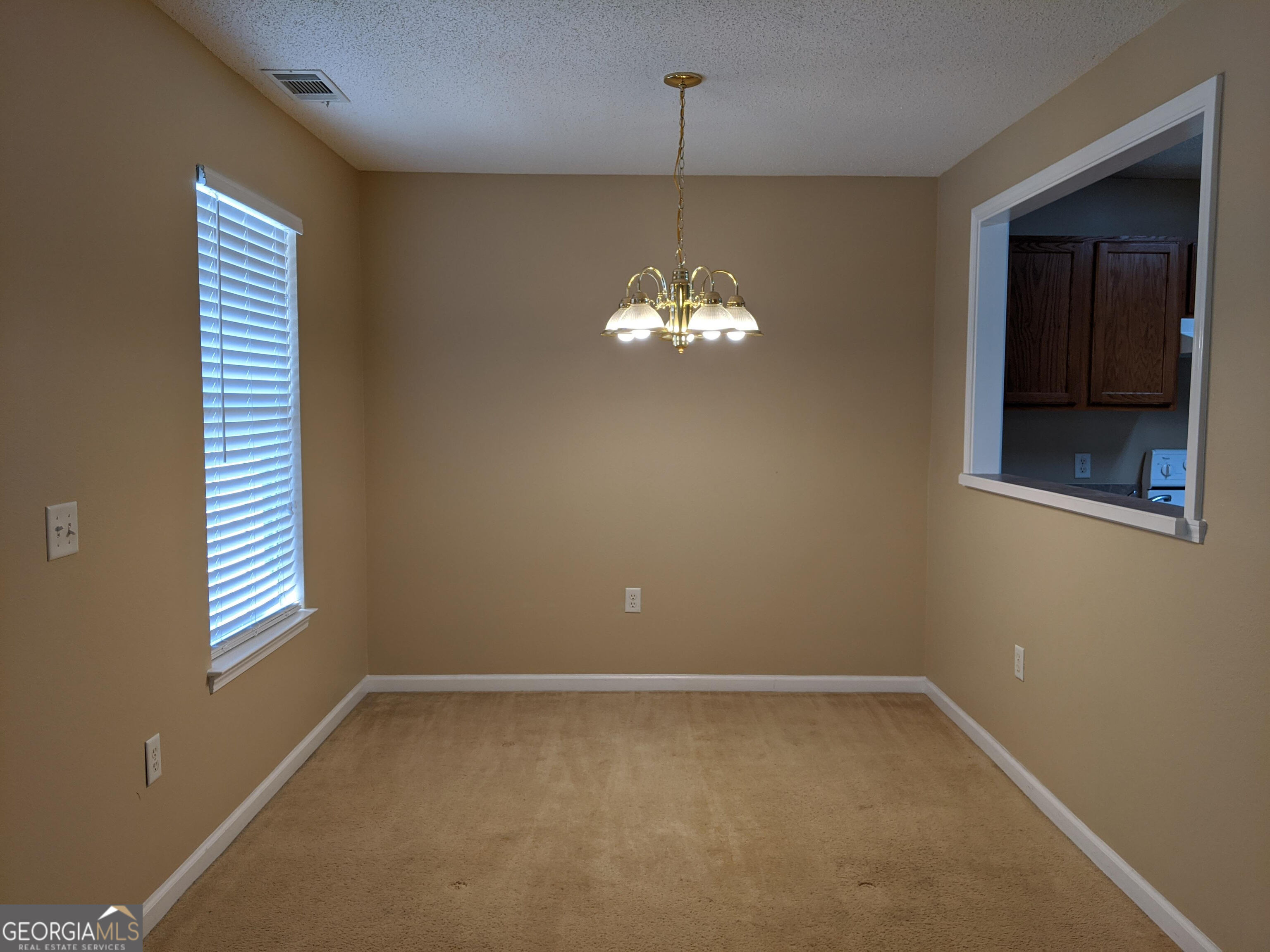 1014 Towne Park Drive East Rincon, GA 31326 - Photo 3 of 21 a view of an empty room with a window