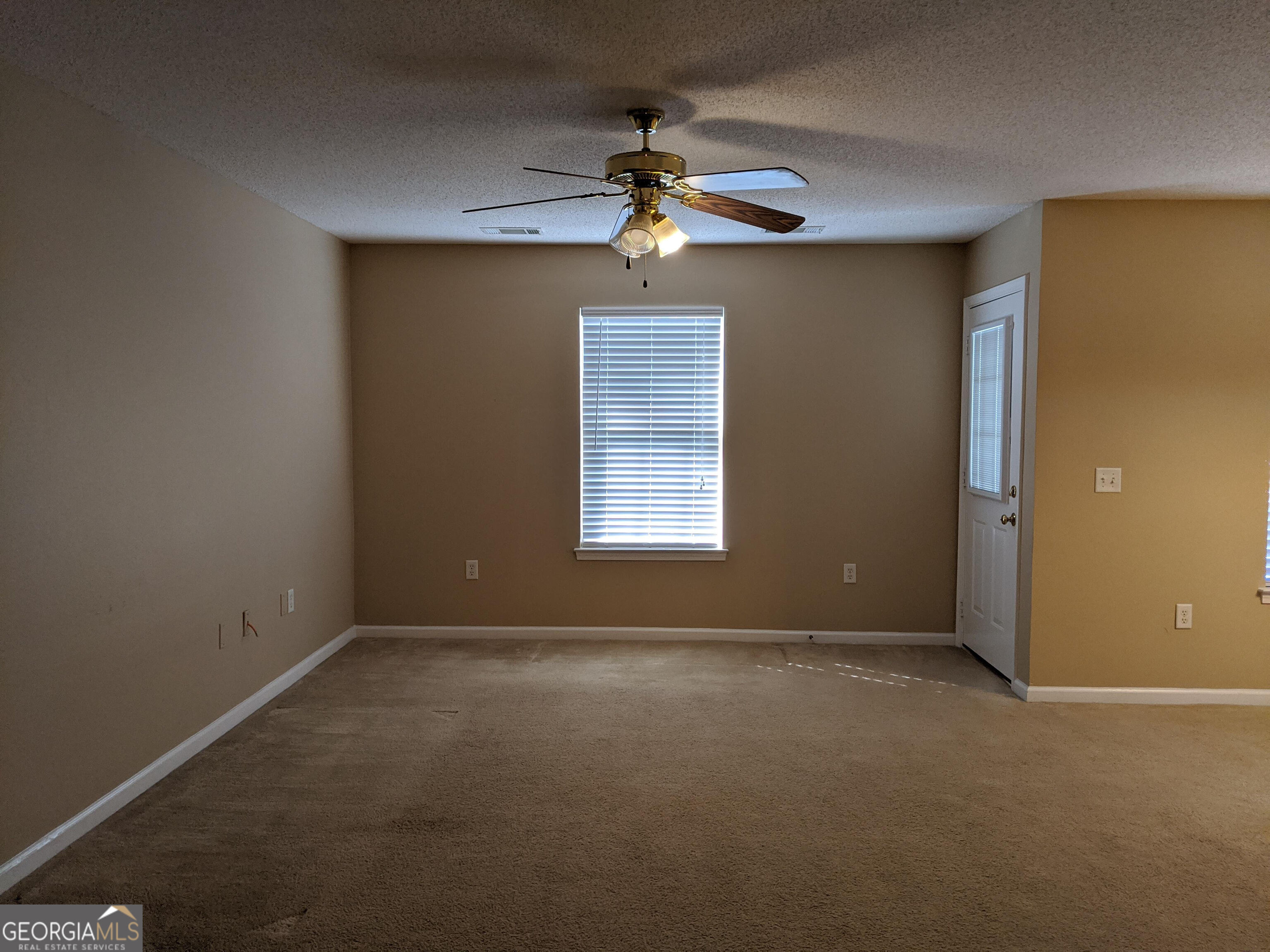 1014 Towne Park Drive East Rincon, GA 31326 - Photo 8 of 21 a view of an empty room with a window