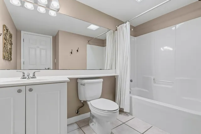 a view of balcony with wooden floor and city view
