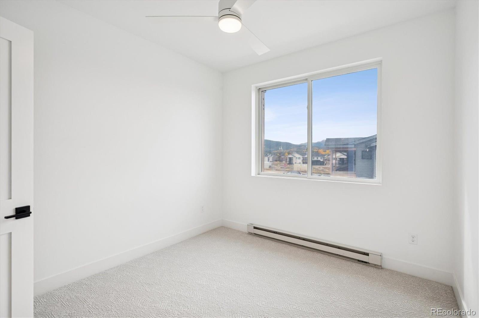 360 Sterling Way, Unit 2 Fraser, CO 80442 - Photo 16 of 30 an empty room with a window