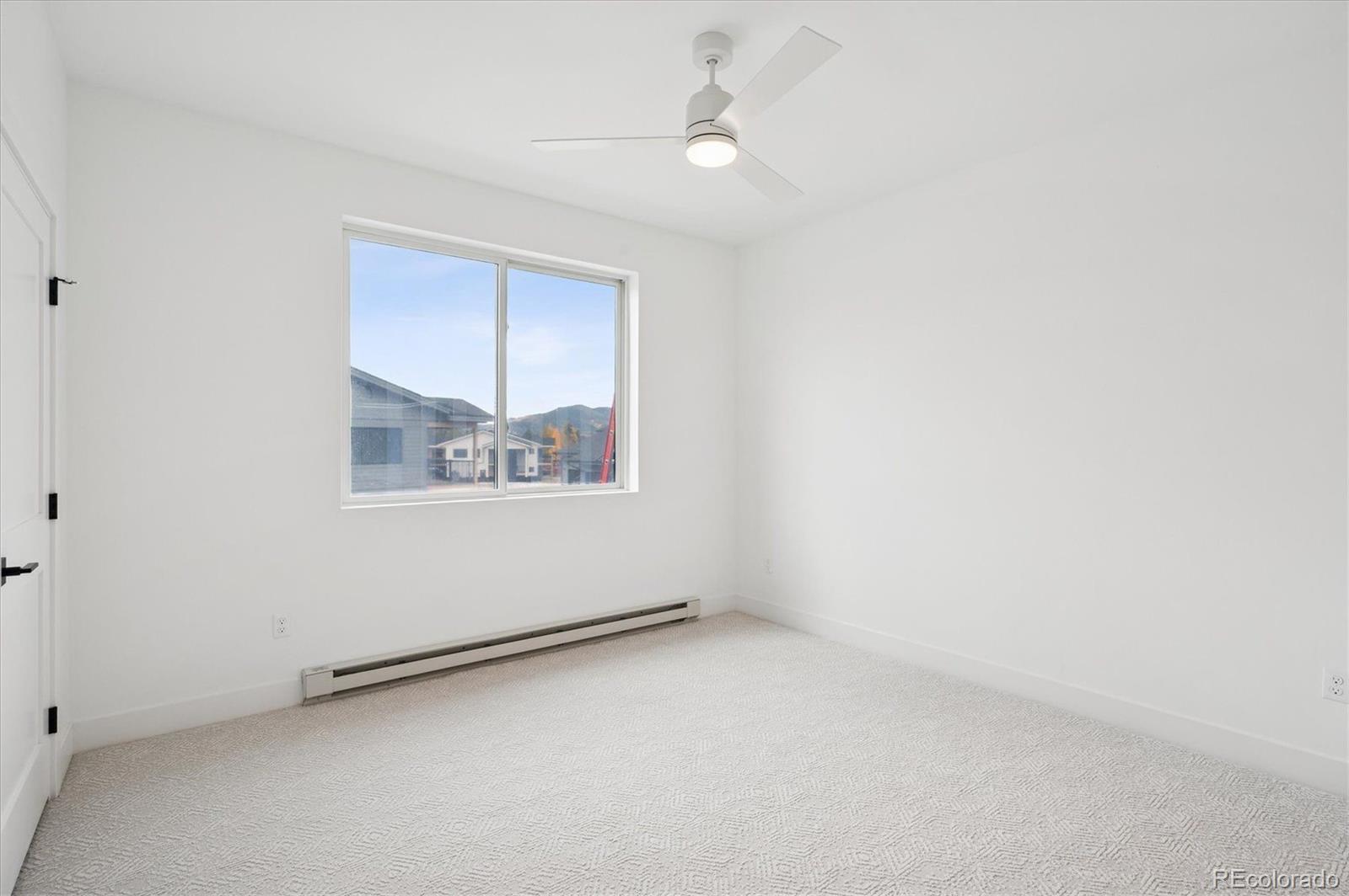 360 Sterling Way, Unit 2 Fraser, CO 80442 - Photo 17 of 30 an empty room with a window