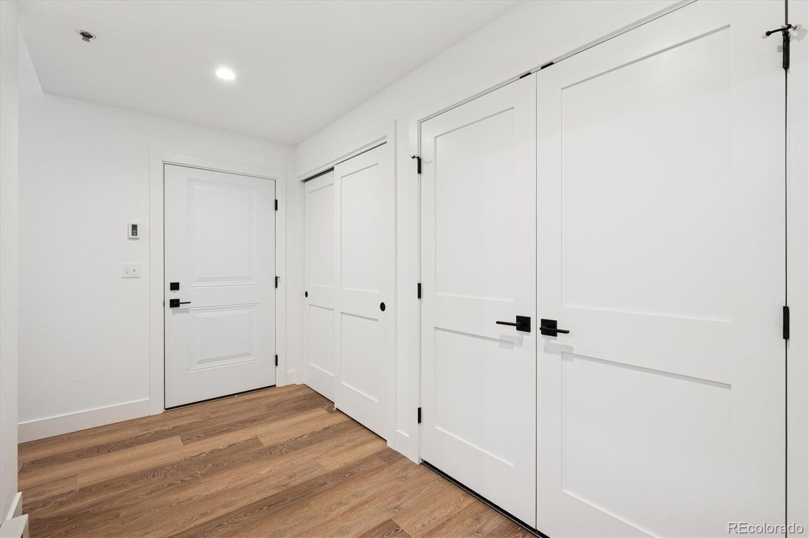 360 Sterling Way, Unit 2 Fraser, CO 80442 - Photo 26 of 30 a view of a room with wooden floor