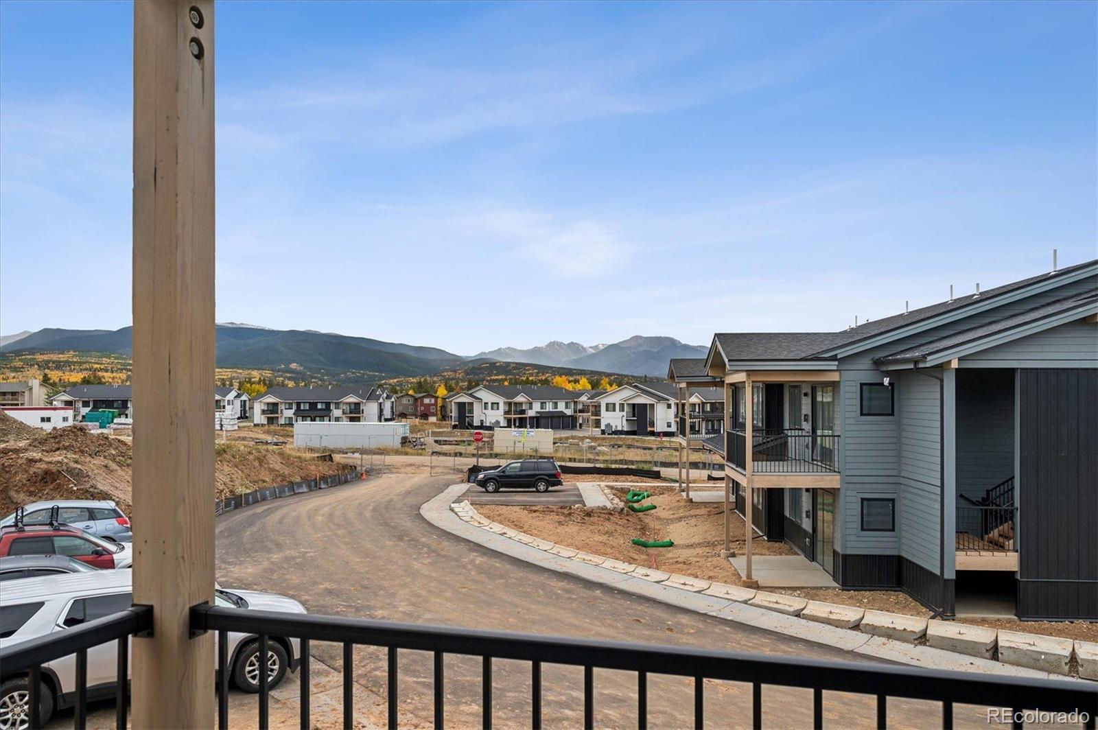 360 Sterling Way, Unit 2 Fraser, CO 80442 - Photo 6 of 30 a view of a terrace with wooden floor and seating space