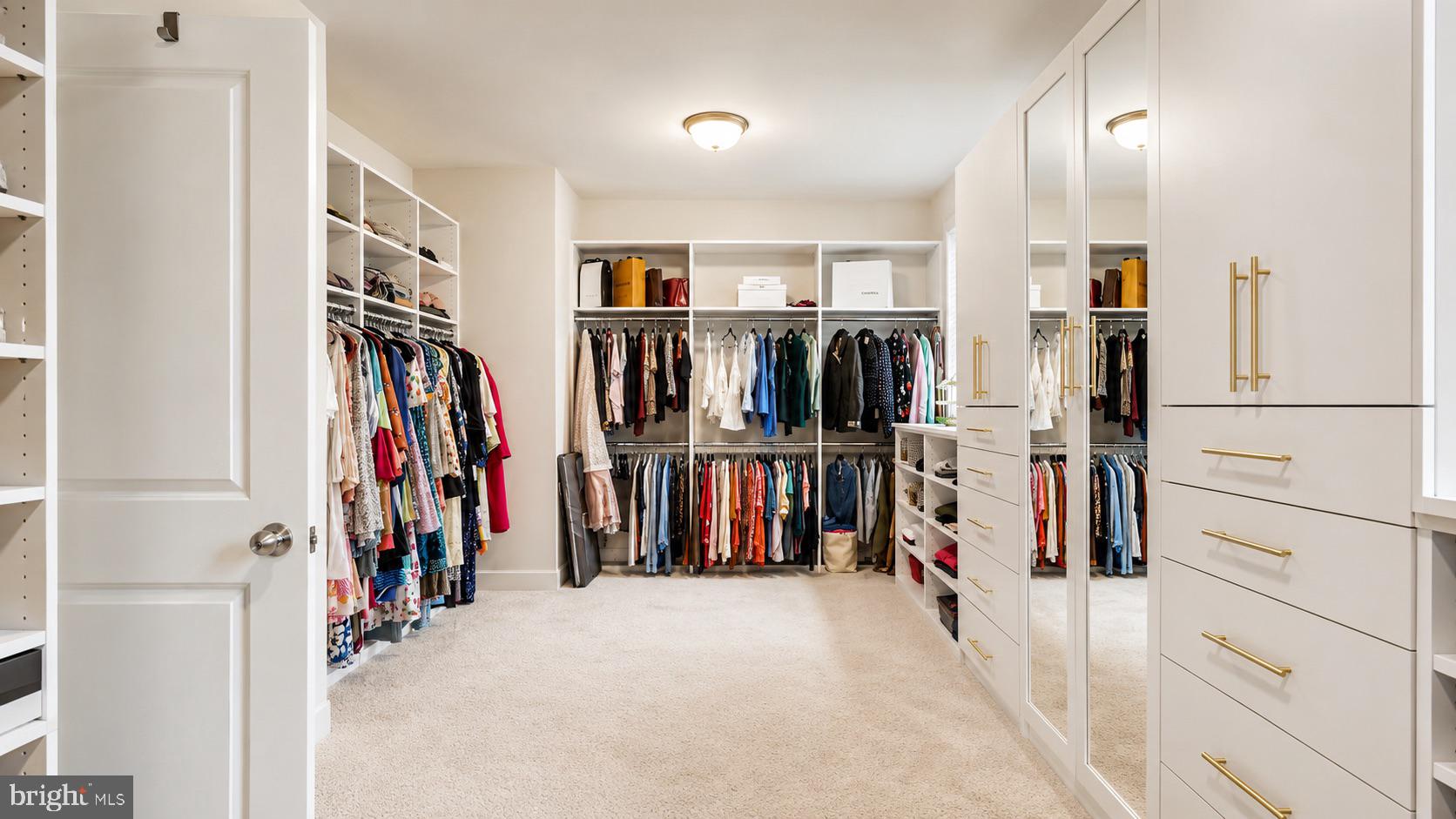 23609 Roselle Ridge Lane Aldie, VA 20105 - Photo 41 of 75 Spacious, organized walk-in closet oasis.