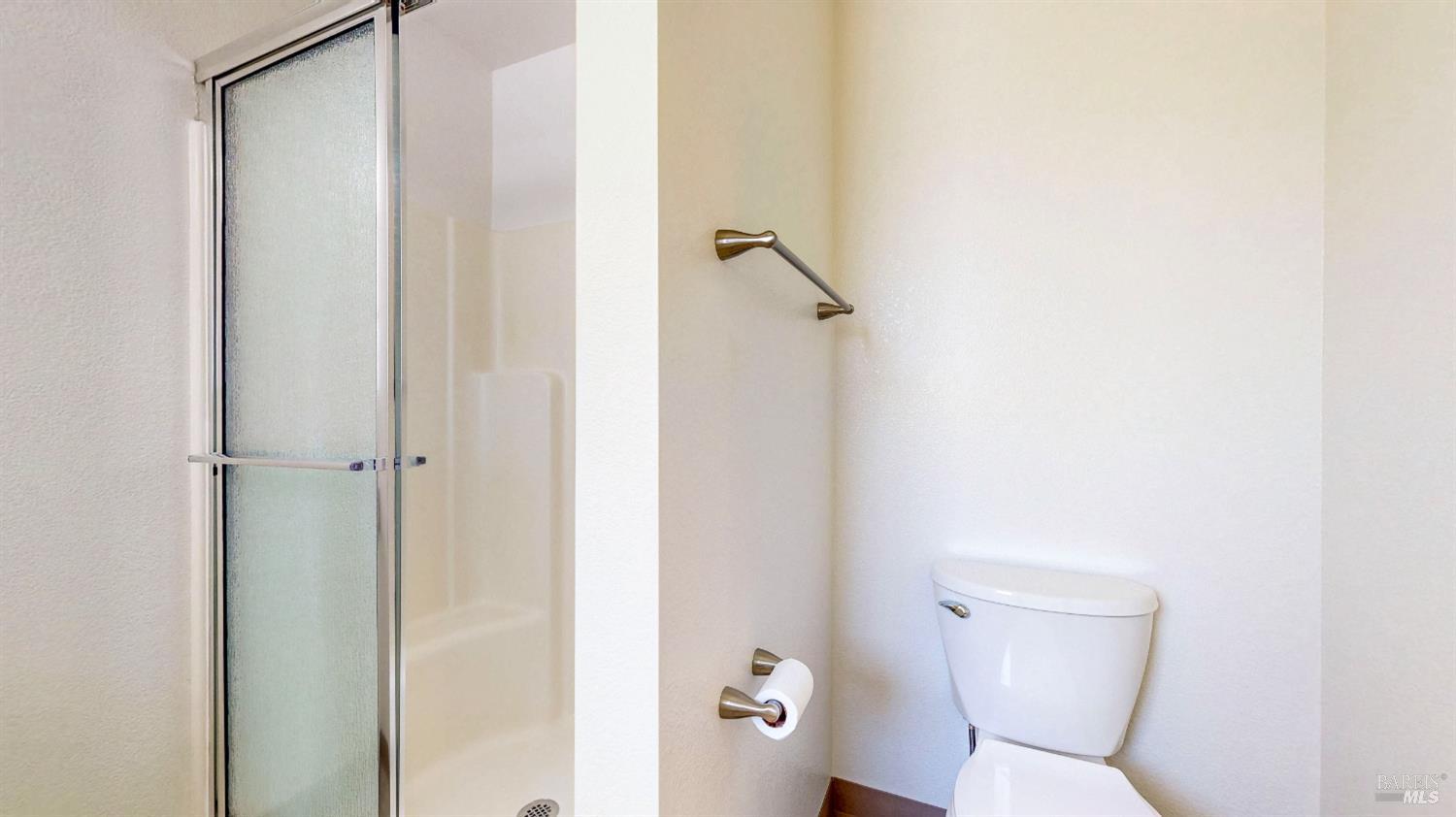 158 North Dutton Avenue Santa Rosa, CA 95401 - Photo 34 of 50 a bathroom with a toilet and a shower