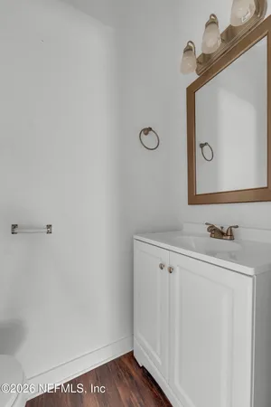 a view of cabinets and wooden floor