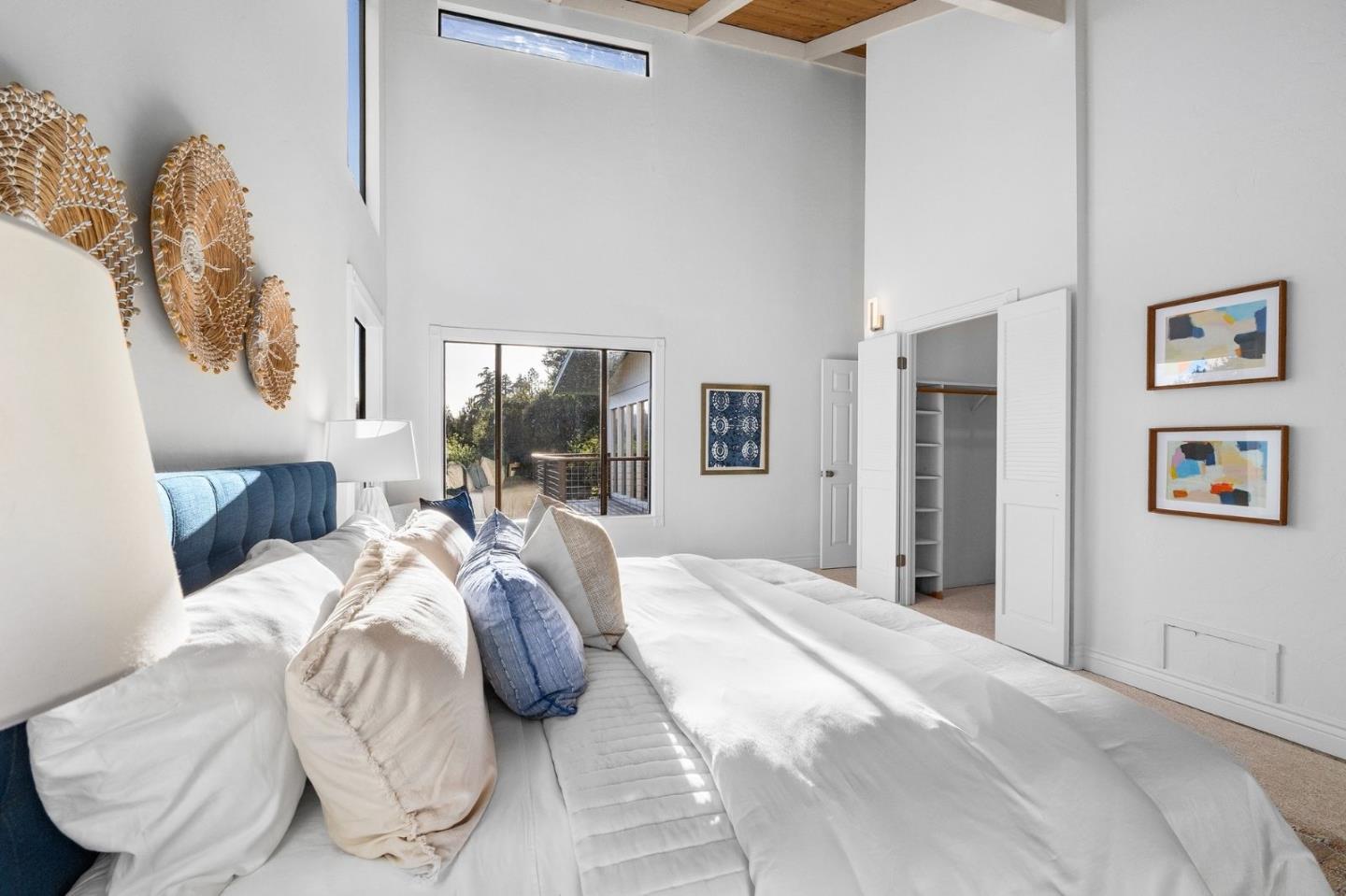 231 Nelson Road Scotts Valley, CA 95066 - Photo 20 of 54 a bedroom with a large bed and a window