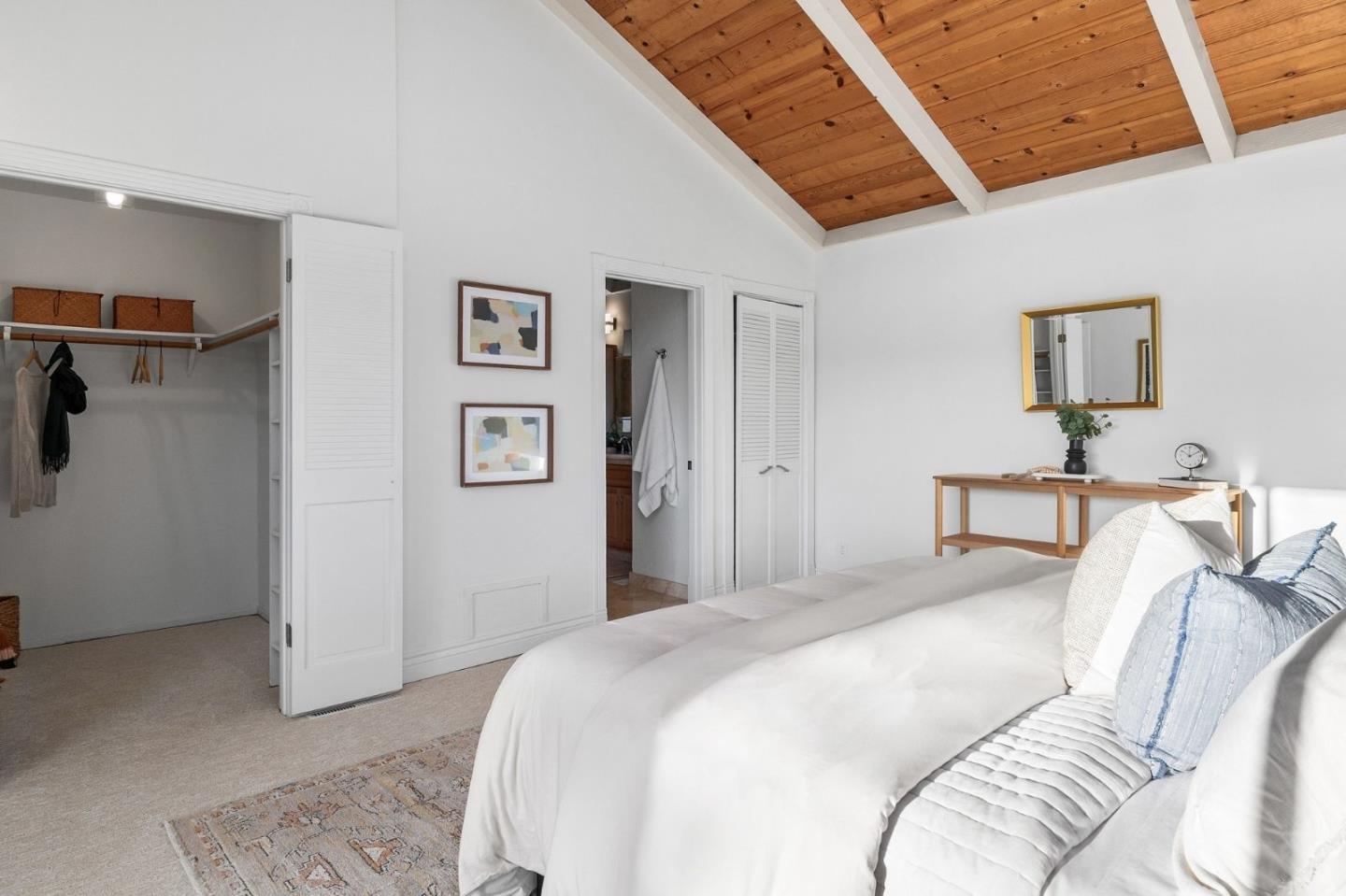231 Nelson Road Scotts Valley, CA 95066 - Photo 23 of 54 a bedroom with a bed and a couch