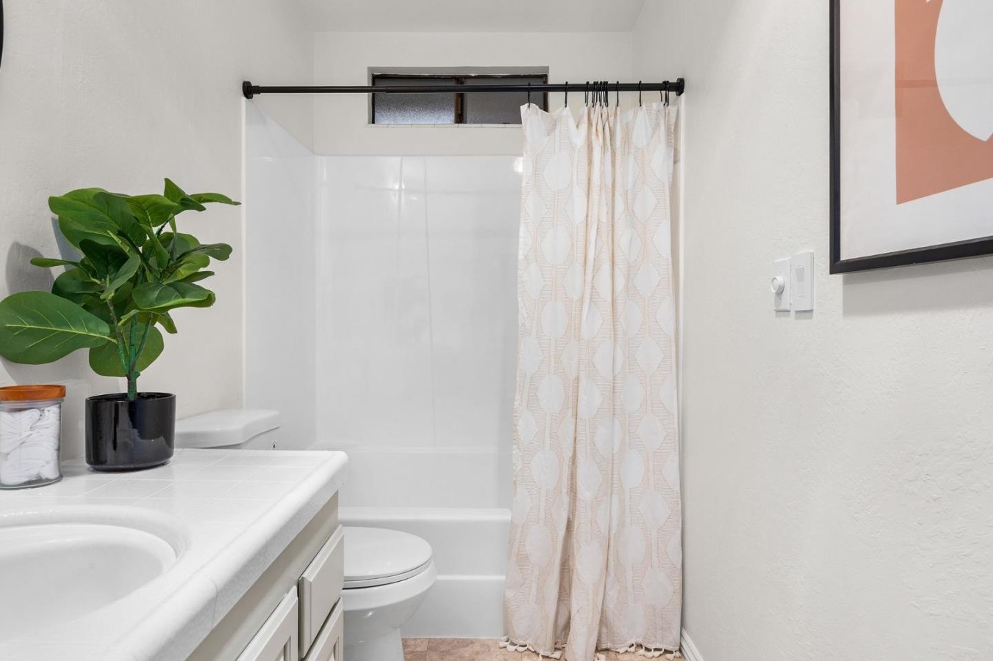 231 Nelson Road Scotts Valley, CA 95066 - Photo 36 of 54 a bathroom with a sink a toilet and shower
