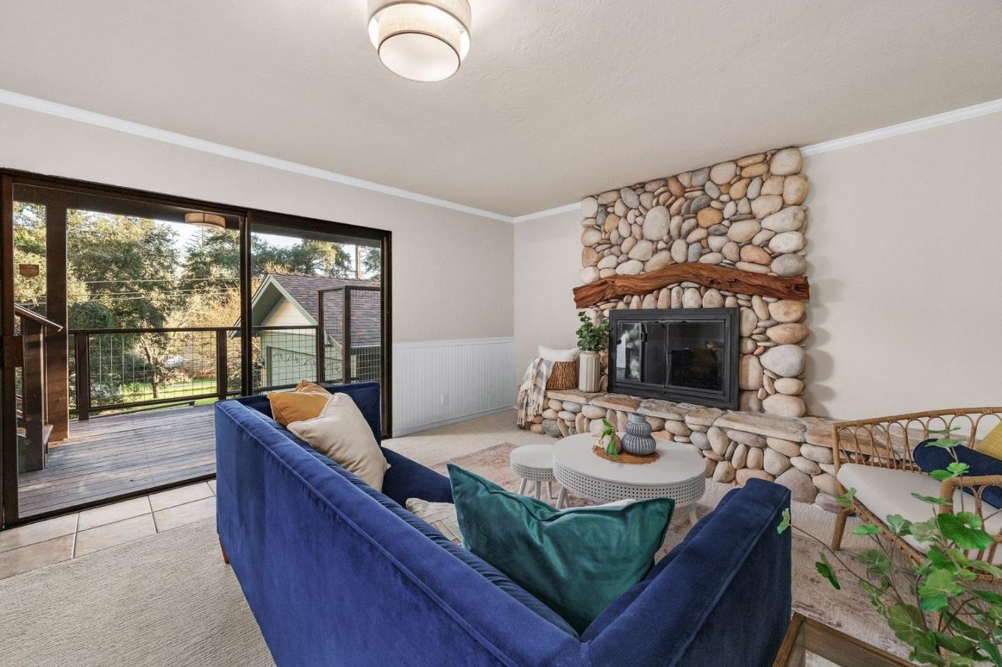 231 Nelson Road Scotts Valley, CA 95066 - Photo 40 of 54 a living room with furniture and a fireplace