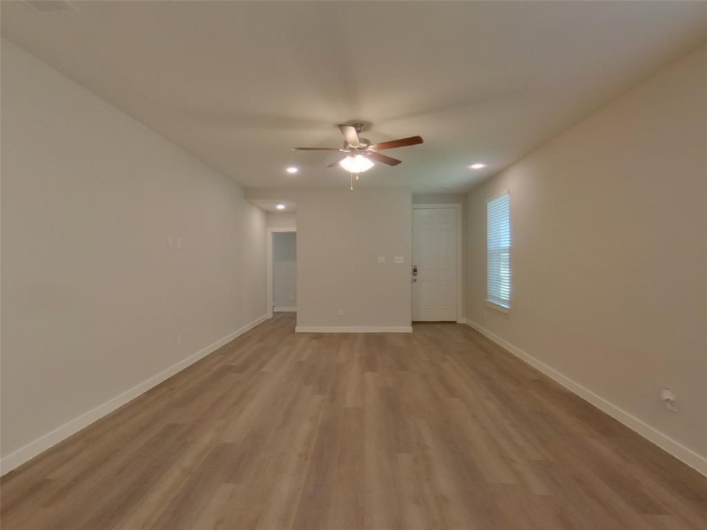2545 Waddill Rivers Way McKinney, TX 75071 - Photo 6 of 9 wooden floor in an empty room