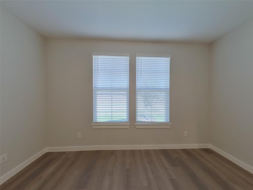 2545 Waddill Rivers Way McKinney, TX 75071 - Photo 7 of 9 an empty room with a window
