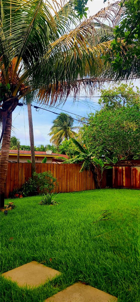 125 Northeast 193rd Street Miami, FL 33179 - Photo 19 of 20 a view of a backyard