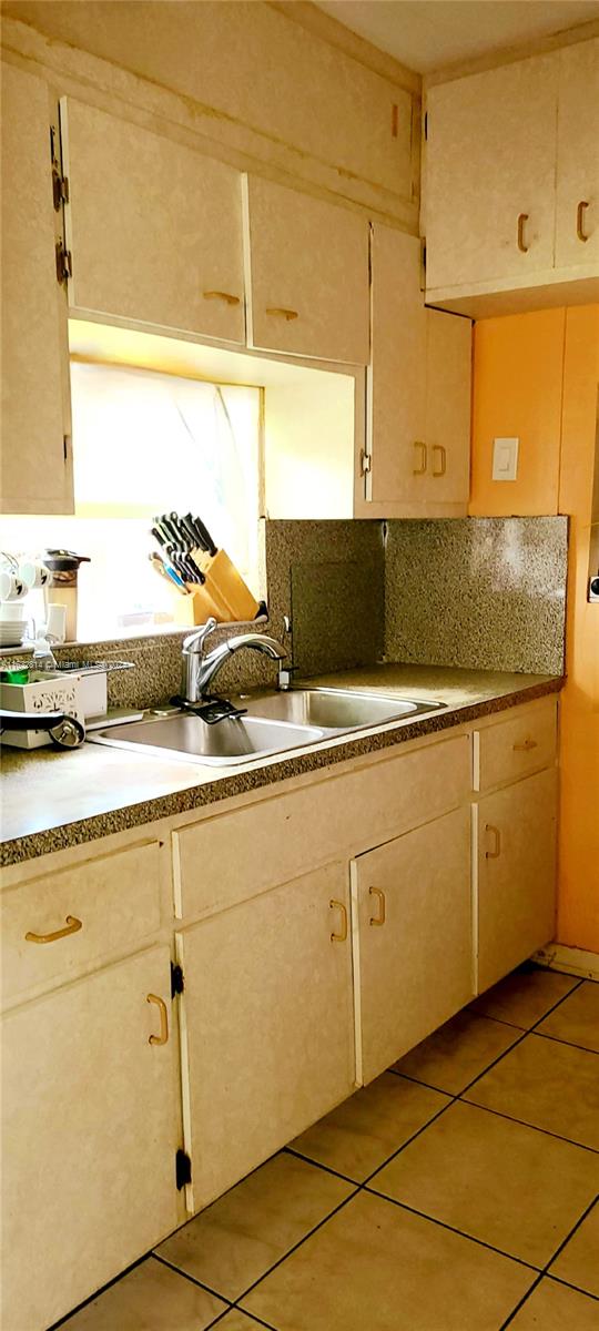 125 Northeast 193rd Street Miami, FL 33179 - Photo 7 of 20 a view of a kitchen with a sink