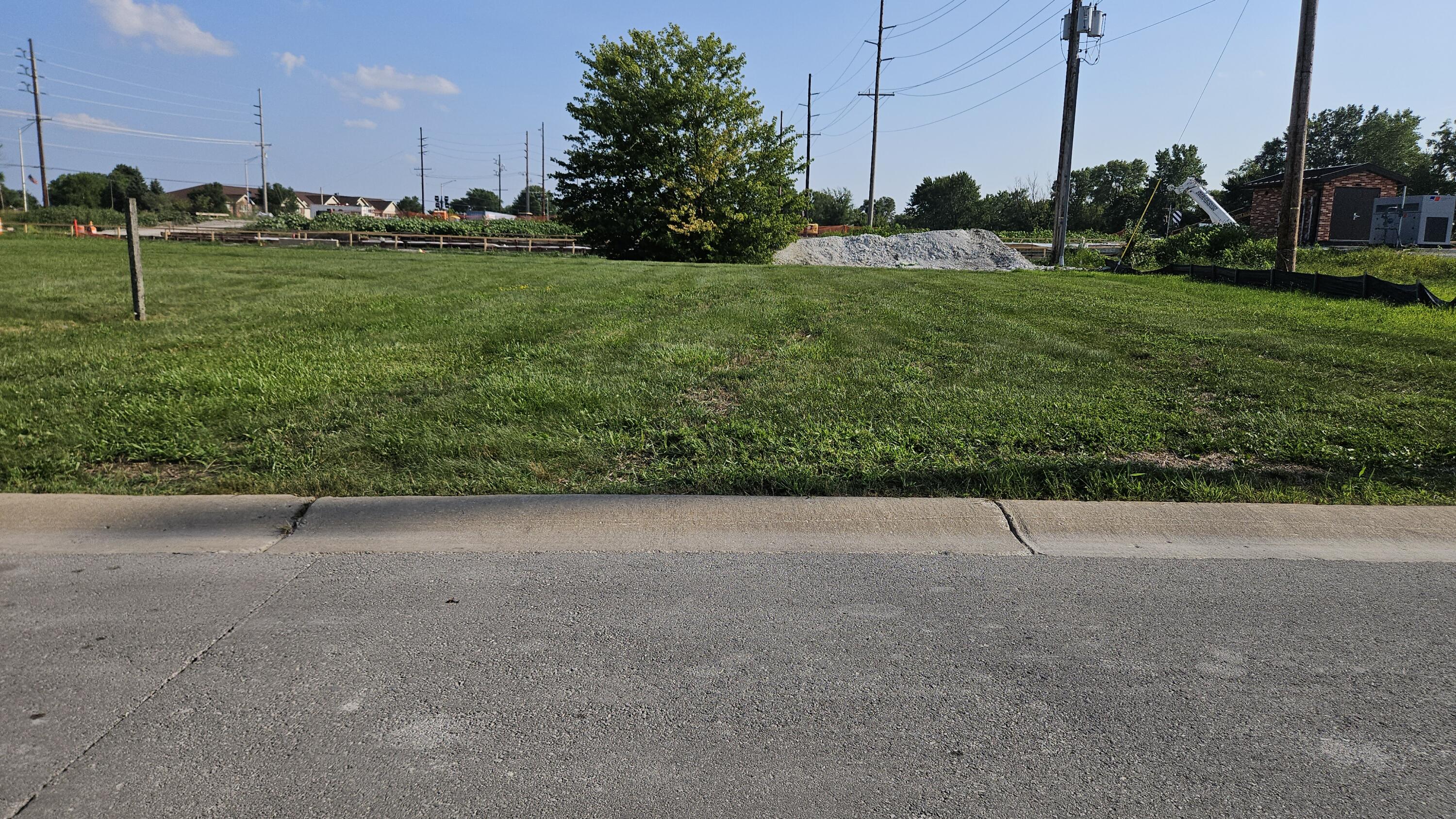 a view of a field with grass