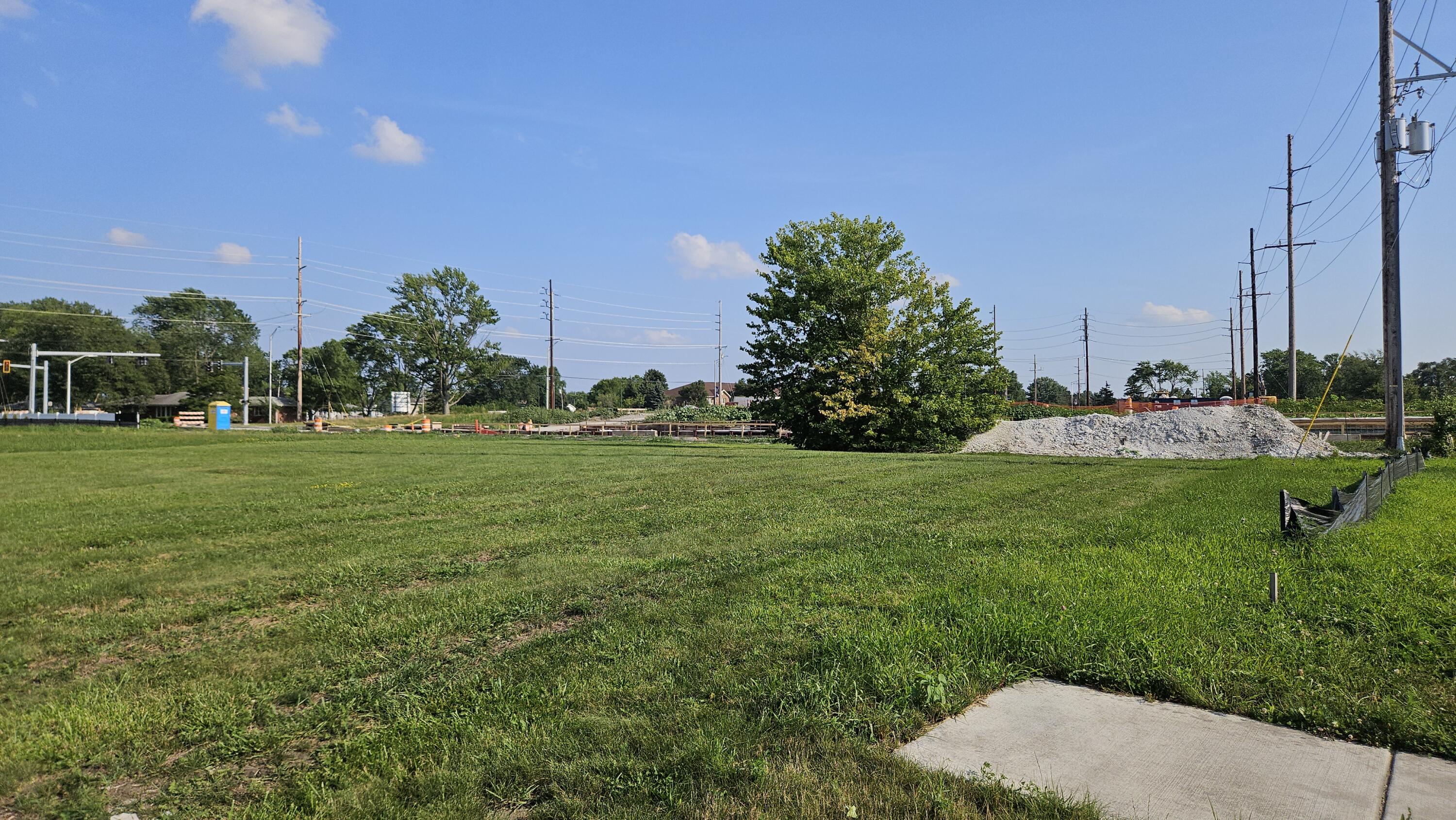 444 Megan Way Munster, IN 46321 - Photo 6 of 7 a view of field with trees in the background