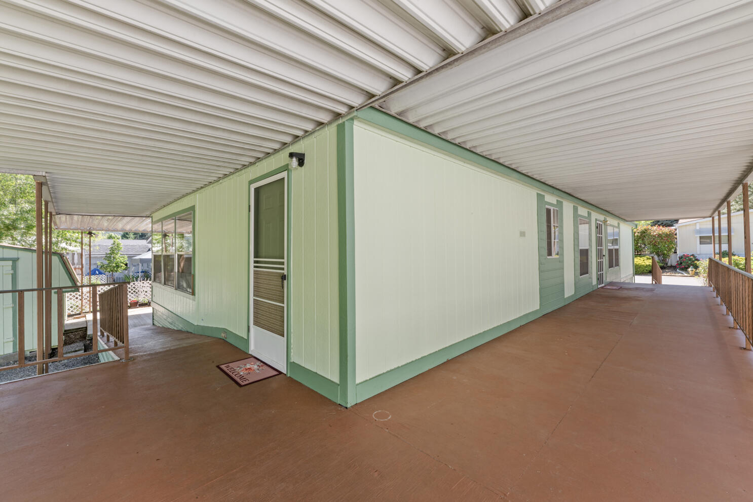 315 West Evans Creek Road, Unit 78 Rogue River, OR 97537 - Photo 5 of 27 a view of a porch with furniture
